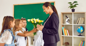 Students giving flowers to their teacher.